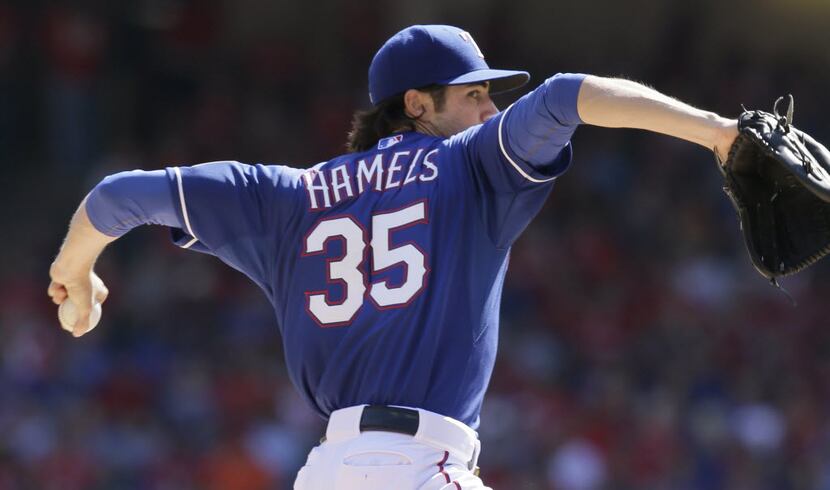 Texas Rangers starting pitcher Cole Hamels throws during a baseball game against the Los...
