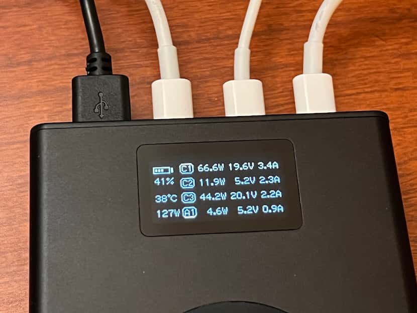 The status screen on the Chargeasap Flash Pro shows the current state of all the ports in...