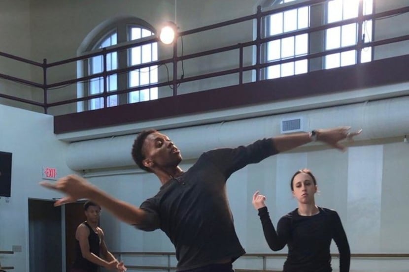 My'Kal Stromile demonstrates choreography for members of DBDT: Encore! The troupe is...
