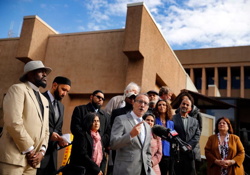 Immigration activist Carlos Quintanilla addresses a crowd outside Irving City Hall. (Tom...