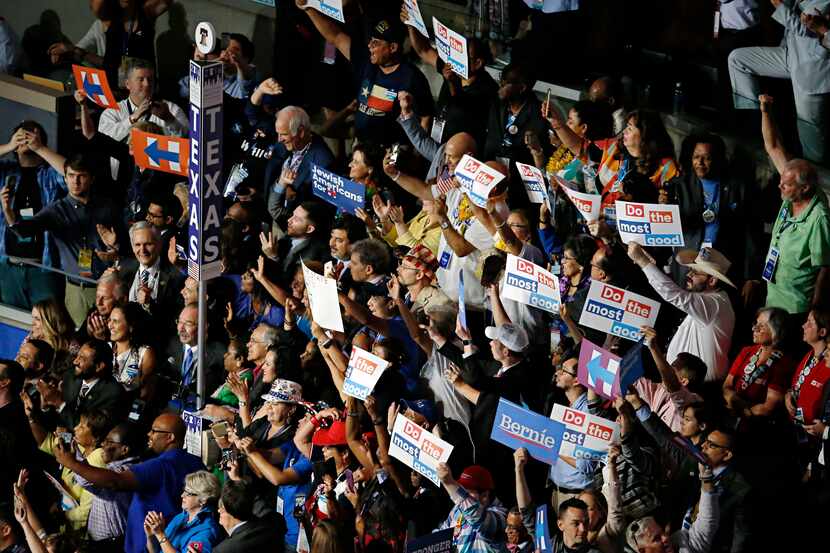 The Texas delegation votes in the roll call at the Democratic National Convention.