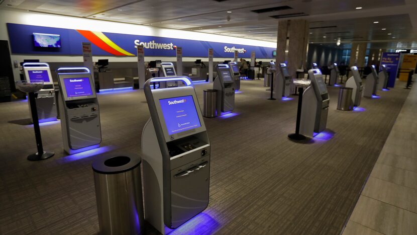 A one passenger at the Southwest Airlines ticket counter checks in at the Tampa...