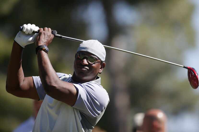 Former NFL player Eric Dickerson hits a tee shot during Aria Resort & Casino's 13th Annual...