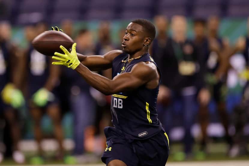 Colorado defensive back Chidobe Awuzie runs a drill at the NFL football scouting combine...