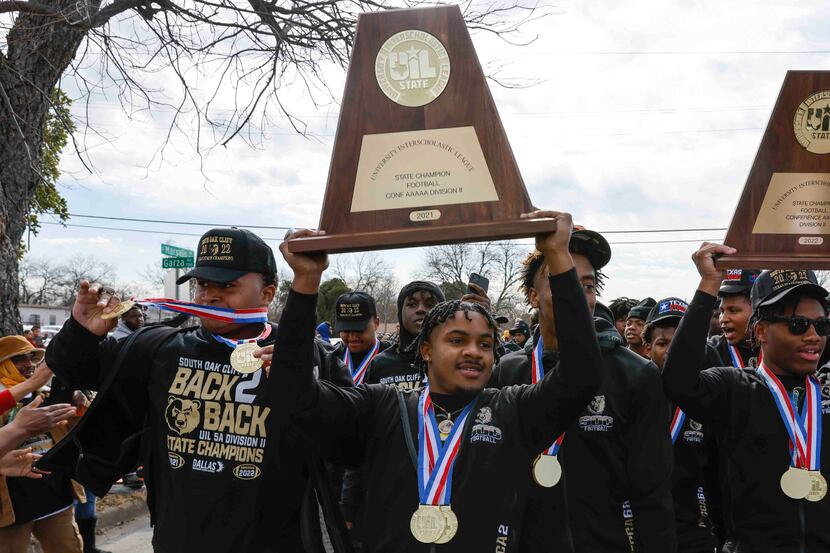 South Oak Cliff players celebrate their back-to-back Class 5A Division II state...