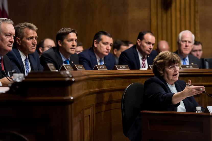 Sens. John Cornyn and Ted Cruz deferred to a GOP-hired attorney during questioning of...