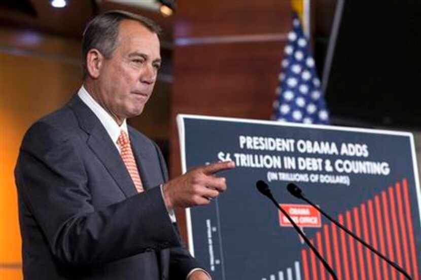 Speaker of the House John Boehner, R-Ohio, talks to reporters about the deadline to fund the...