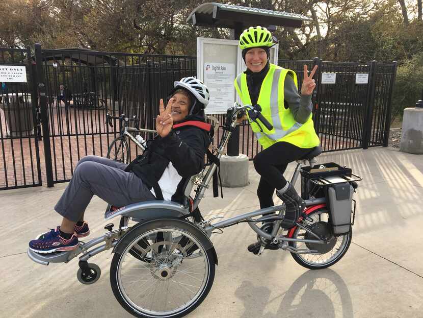 Shannon Catalano (right) takes Mary Davis for a spin as part of the Lone Star Wheelers'...