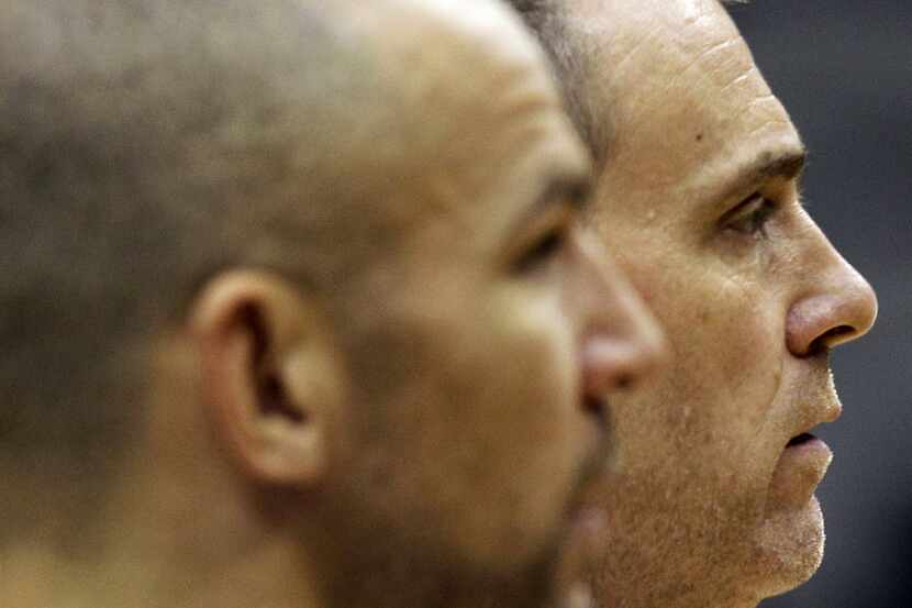 Dallas Mavericks head coach Rick Carlisle, right, and Jason Kidd watch a drill during a...