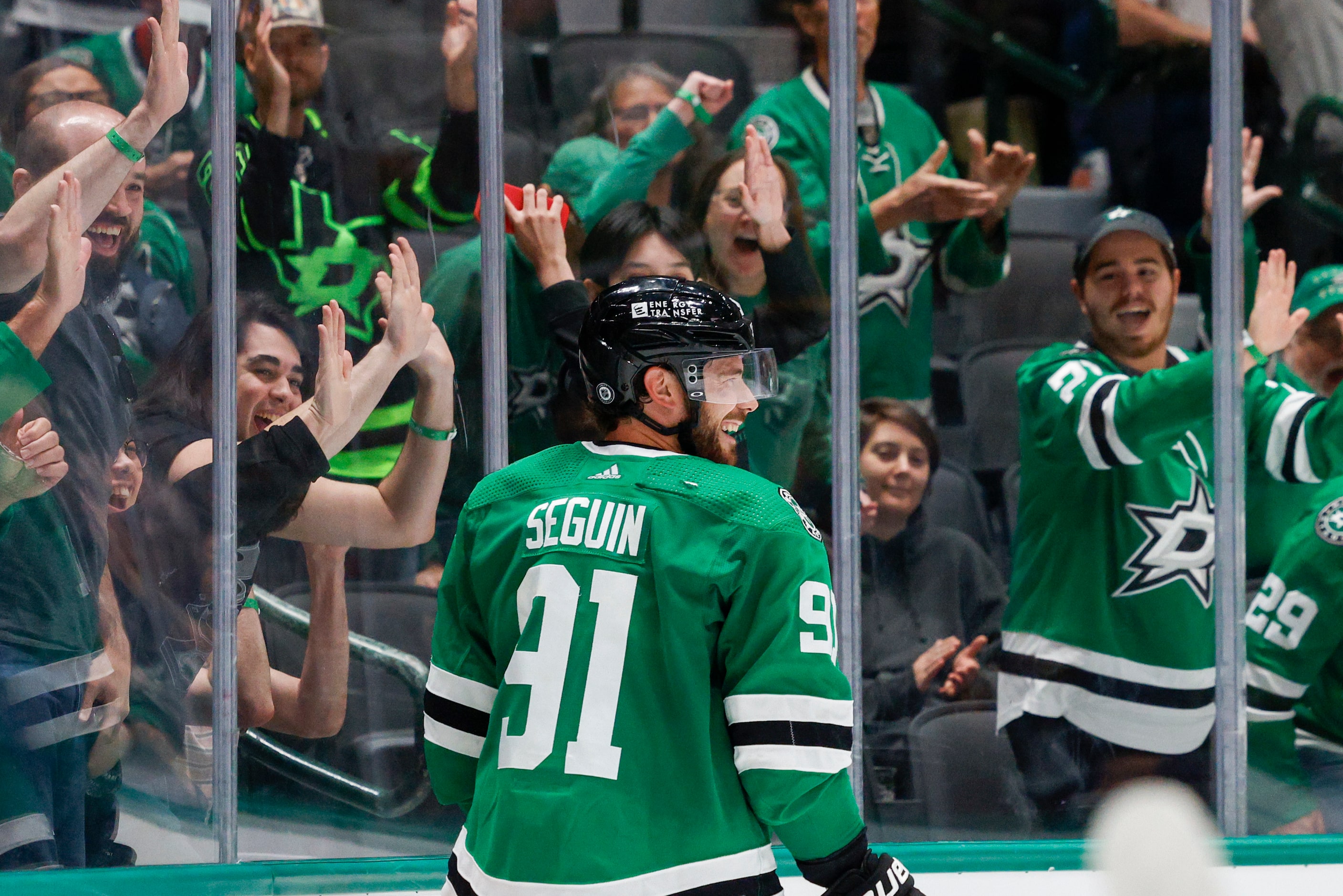 Dallas Stars center Tyler Seguin (91) smiles after scoring a goal during the third period of...