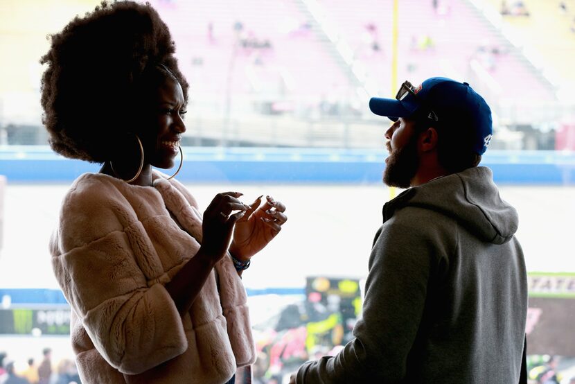 FONTANA, CA - MARCH 18:  Bozoma Saint John meets with Darrell Wallace Jr., driver of the #43...