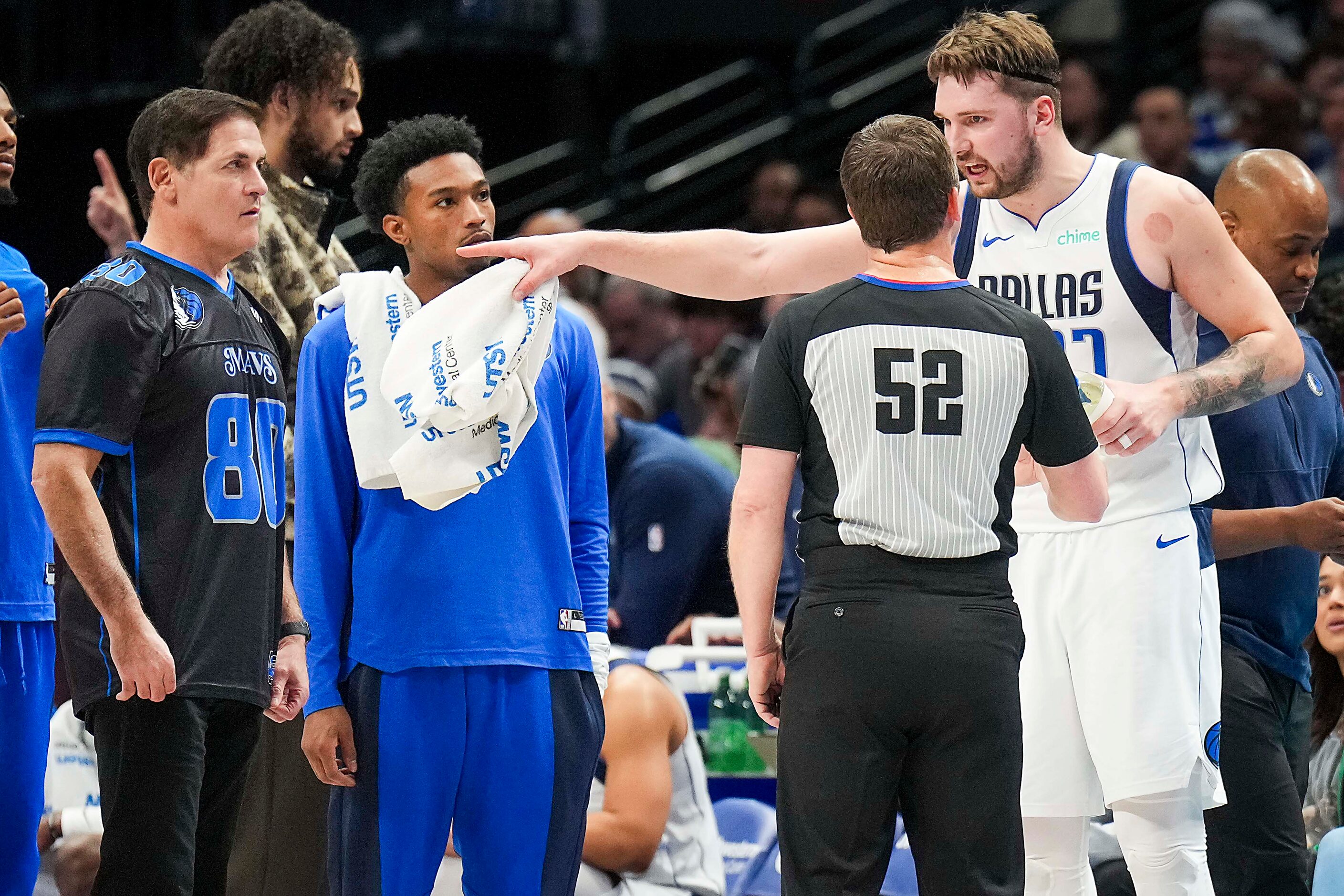 Dallas Mavericks guard Luka Doncic (77) argues for a call as Mark Cuban looks on during the...