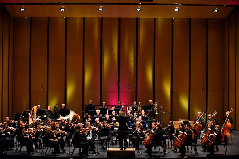 Conductor Ruth Reinhardt, center, leads the Dallas Symphony Orchestra in Rossini's The...