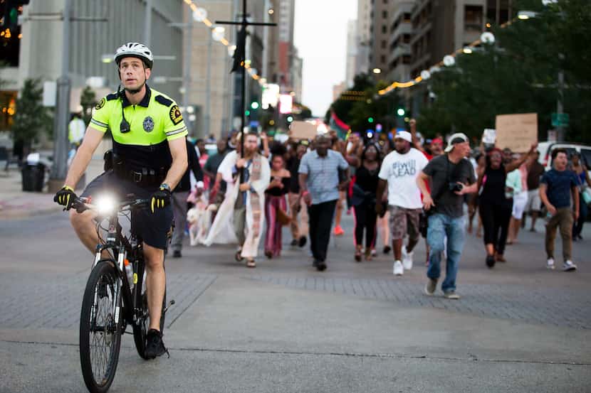 Some Dallas police officers were on bikes to help provide traffic control and security for...