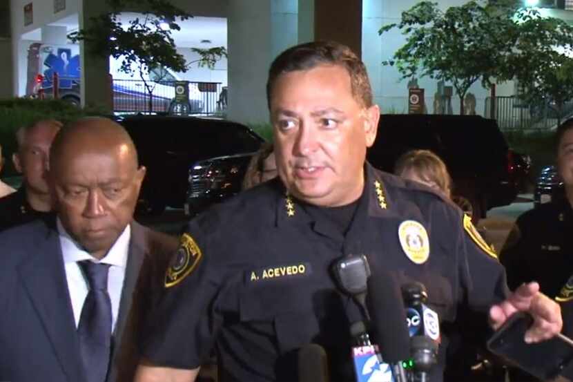 Houston police chief Art Acevedo and Mayor Sylvester Turner (left) address reporters after...