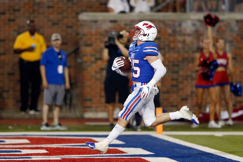 Southern Methodist Mustangs running back TJ McDaniel (25) rushes up the field for a...