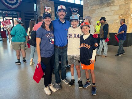 Twins Clayton Hanner (middle right) and Caleb Hanner (far right), 12, pose for a photo with...