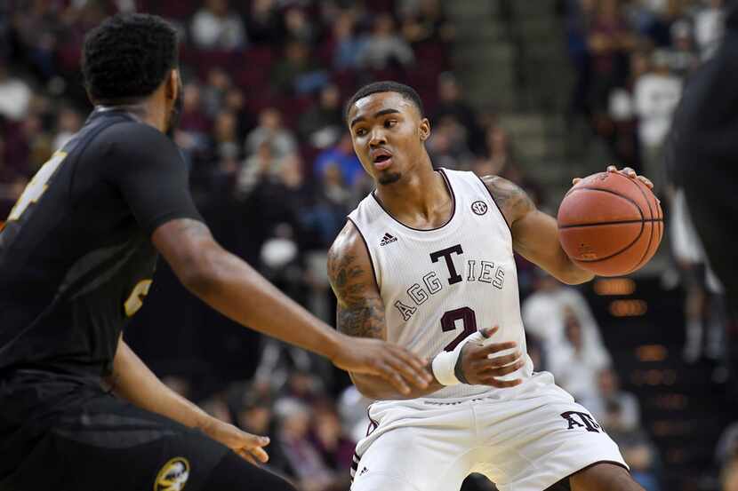 FILE - Texas A&M's TJ Starks (2) looks for an opening to the basket during a game against...