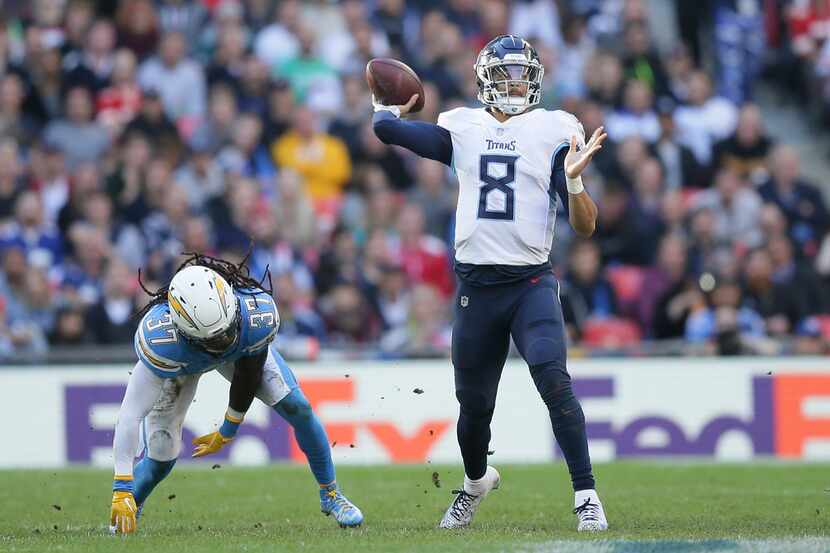 Tennessee Titans quarterback Marcus Mariota (8) passes the ball during the first half of an...