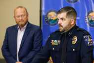 Everman police Chief Craig Spencer speaks during a news conference announcing indictments in...