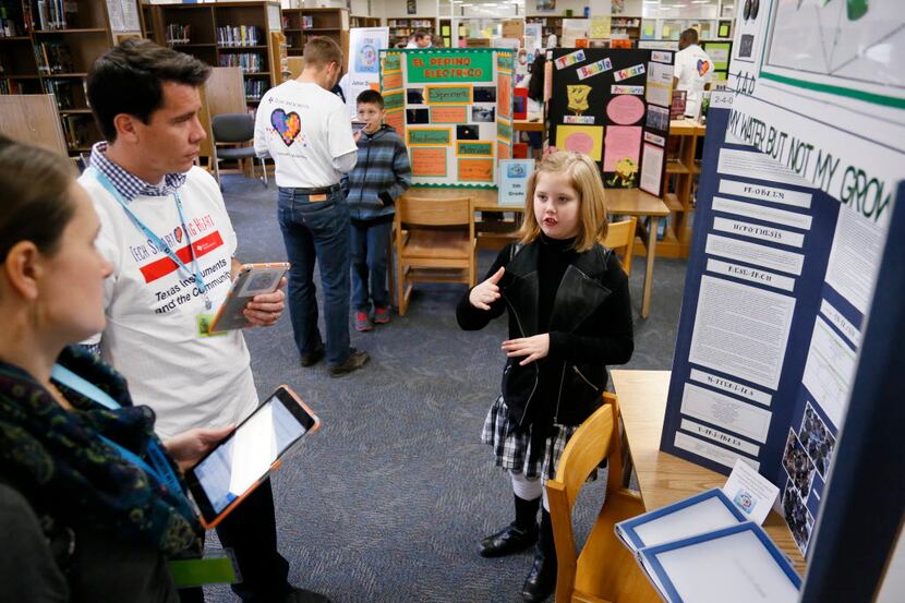 Josey Edgar, a fourth-grader from Dealey Montessori, presented her project to judges from...