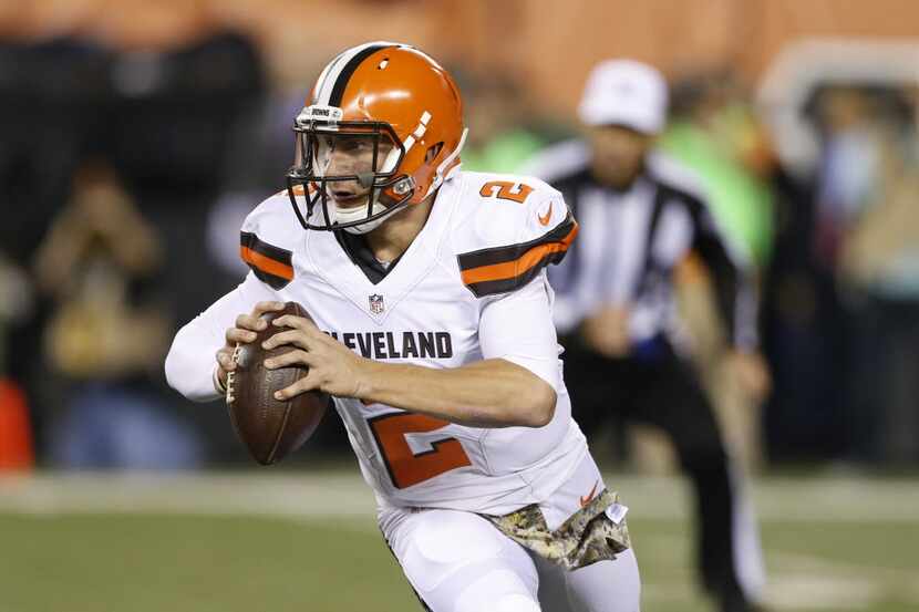Cleveland Browns quarterback Johnny Manziel runs the ball in the first half of an NFL...