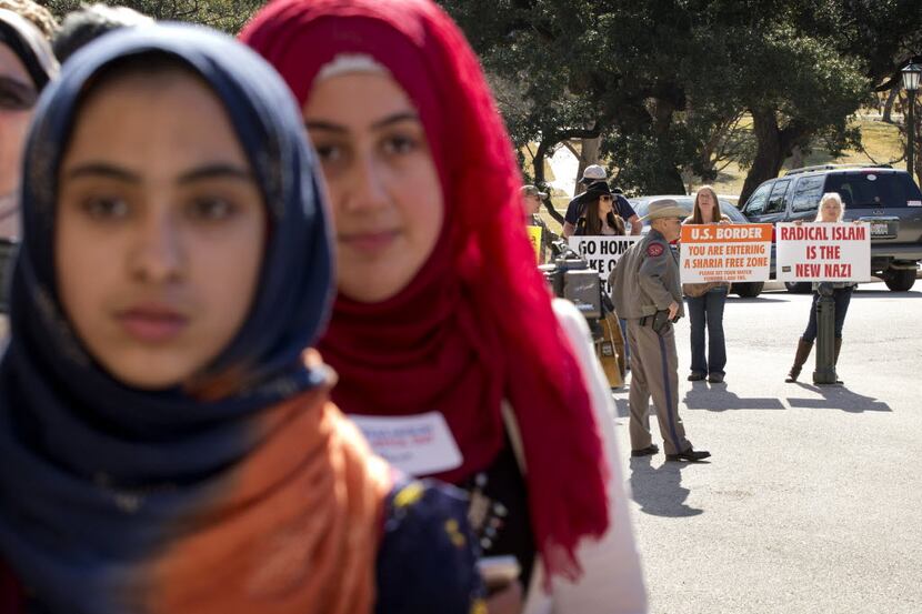 
Fatima Burney, left, 14, of Fort Worth, and Marwa Qudah, 17, of Katy, at Texas Muslim...