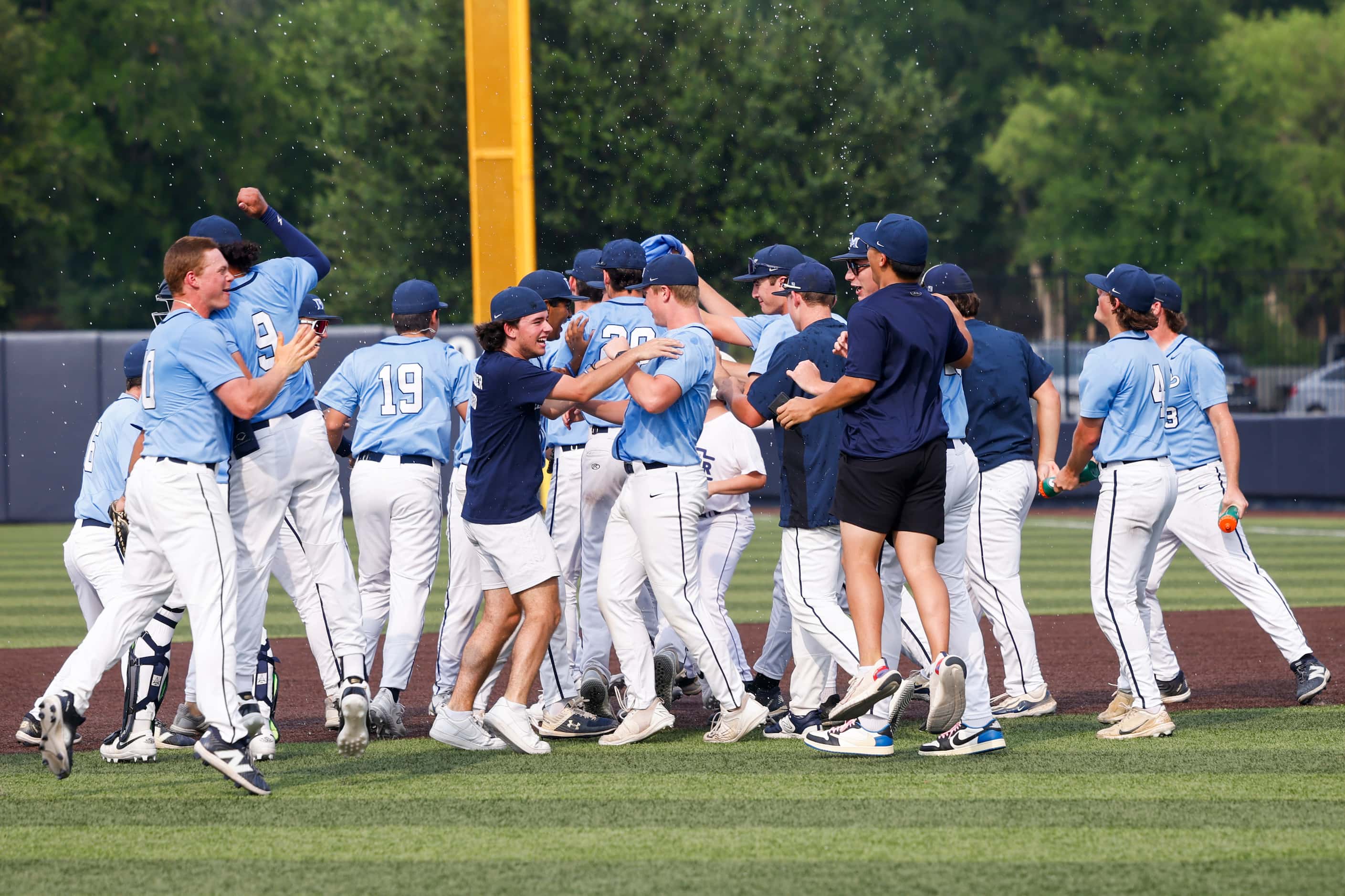 Flower Mound players celebrate after Game 3 of a best-of-3 Class 6A Region I semifinal...
