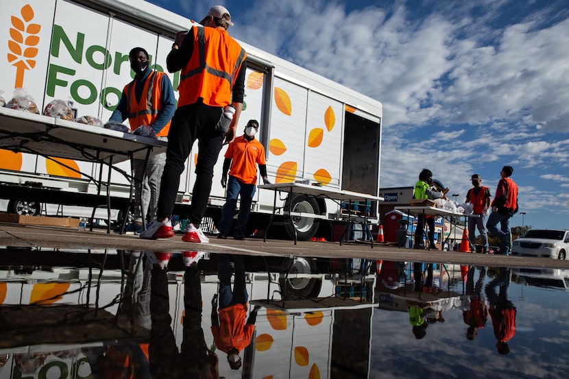 The North Texas Food Bank hosted a walk-up food distribution at the Park at Forest-Audelia...