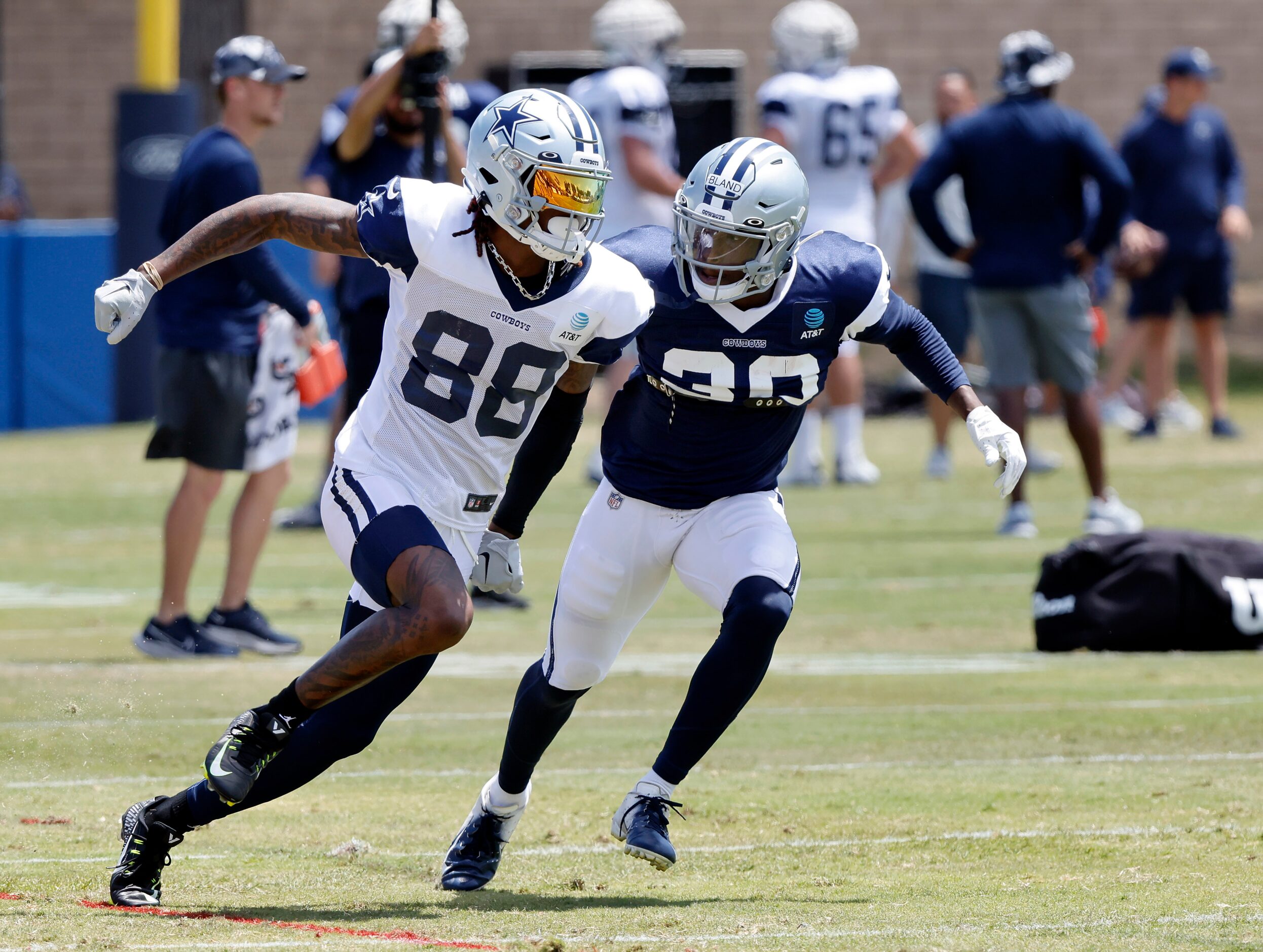 Dallas Cowboys cornerback DaRon Bland (30) covers wide receiver CeeDee Lamb (88) during...