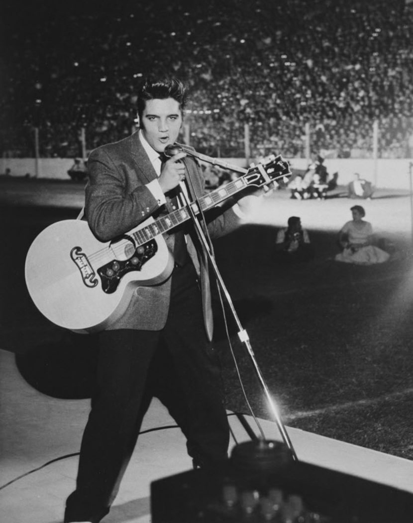 Elvis Presley performs during the 1956 State Fair of Texas.