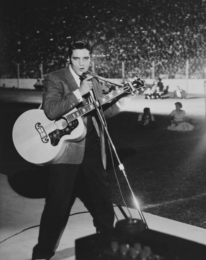 Elvis Presley performs during the 1956 State Fair of Texas.