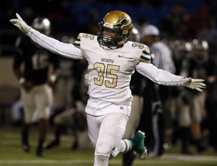 DeSoto High LB Chris Orr (35) celebrates the defense making a stand on fourth down during...