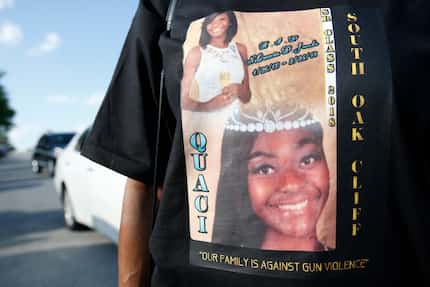 A family friend of NeQuacia Jacobs wears a shirt in her memory after South Oak Cliff High...