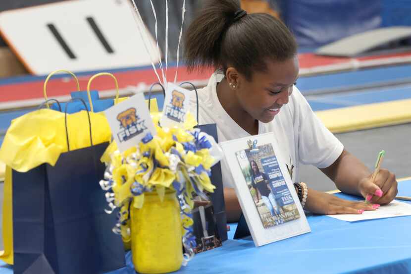 Morgan Price, 16-year-old graduate of Coppell High School, signs her letter of intent to...