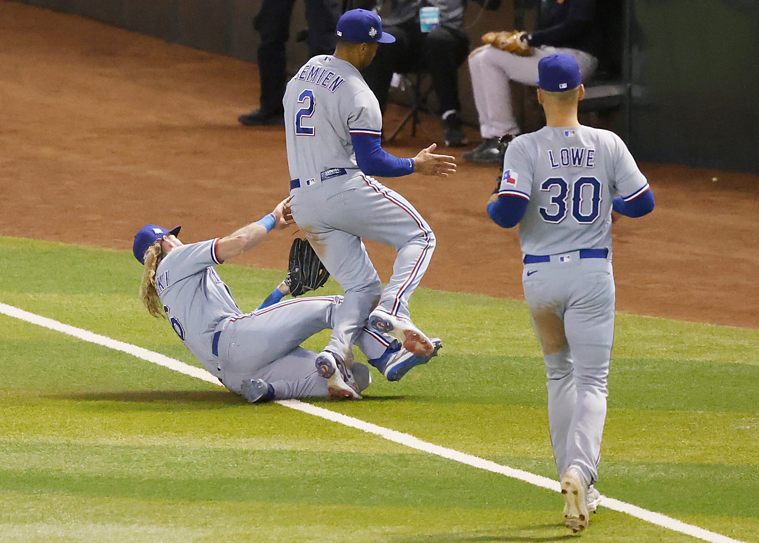 Texas Rangers right fielder Travis Jankowski makes a sliding catch on a fly ball off the bat...