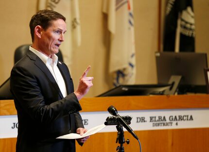 Dallas County Judge Clay Jenkins speaks at a press conference updating an amended order for...