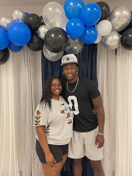 Cowboys rookie DeMarvion Overshown (right) poses with his mom Felicia Williams during...