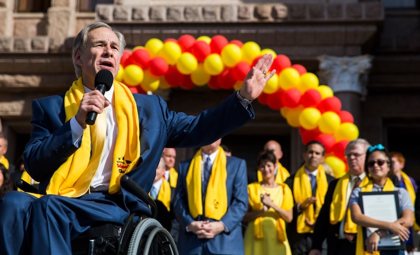 Texas Gov. Greg Abbott speaks as demonstrators rally to show their support for expanding...