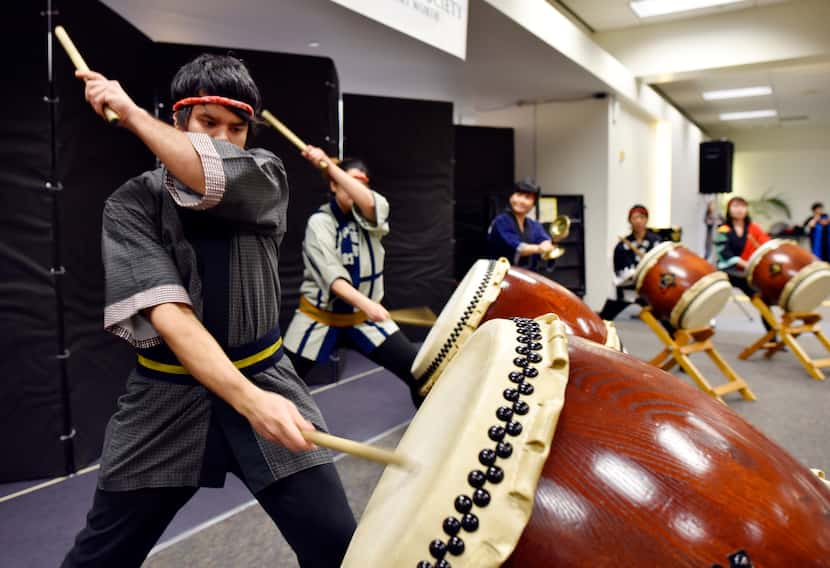 Jay Cantu, 25, of the drum group Dallas Kiyari Daiko, plays a drum called a taiko during a...