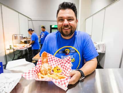 Abel Gonzales, pictured here with chicken-fried lobster, is a 20-year State Fair of Texas...