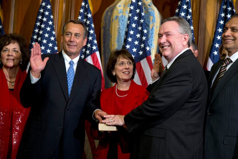 Rep. Steve Stockman (second from right, in a mock swearing-in ceremony with Speaker of the...