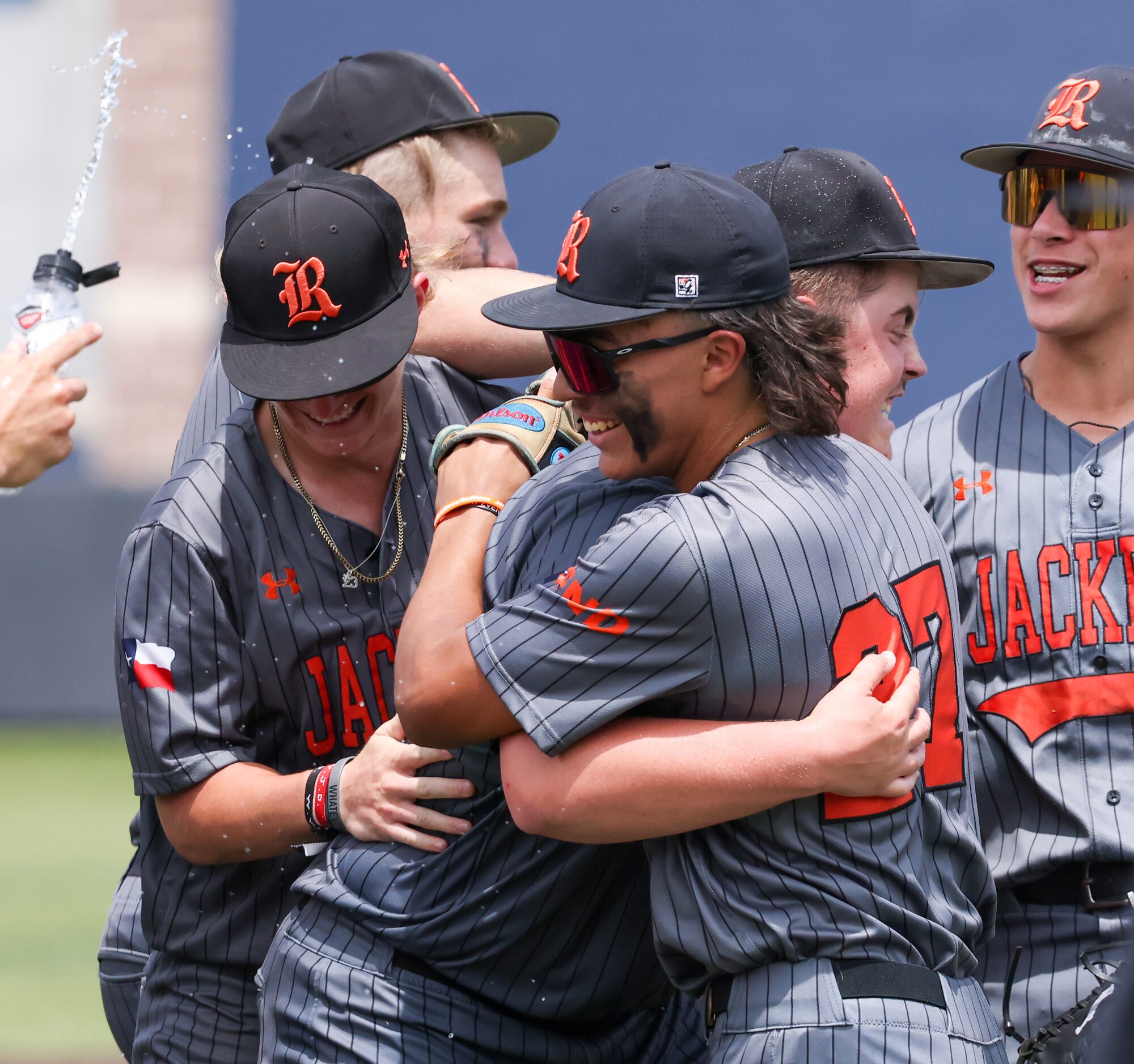 Rockwall celebrates defeating Mansfield in an area round game of the UIL baseball playoffs...