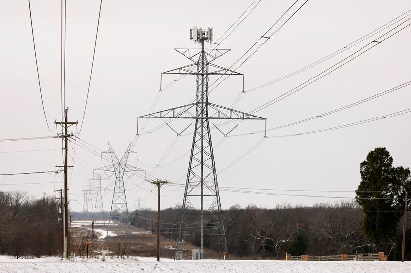 Large electrical transmission lines crossed through South Arlington on Feb. 17, 2021, during...