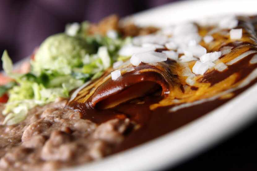 Tex-Mex cheese enchiladas: To be authentic, they must be filled with processed cheese or...