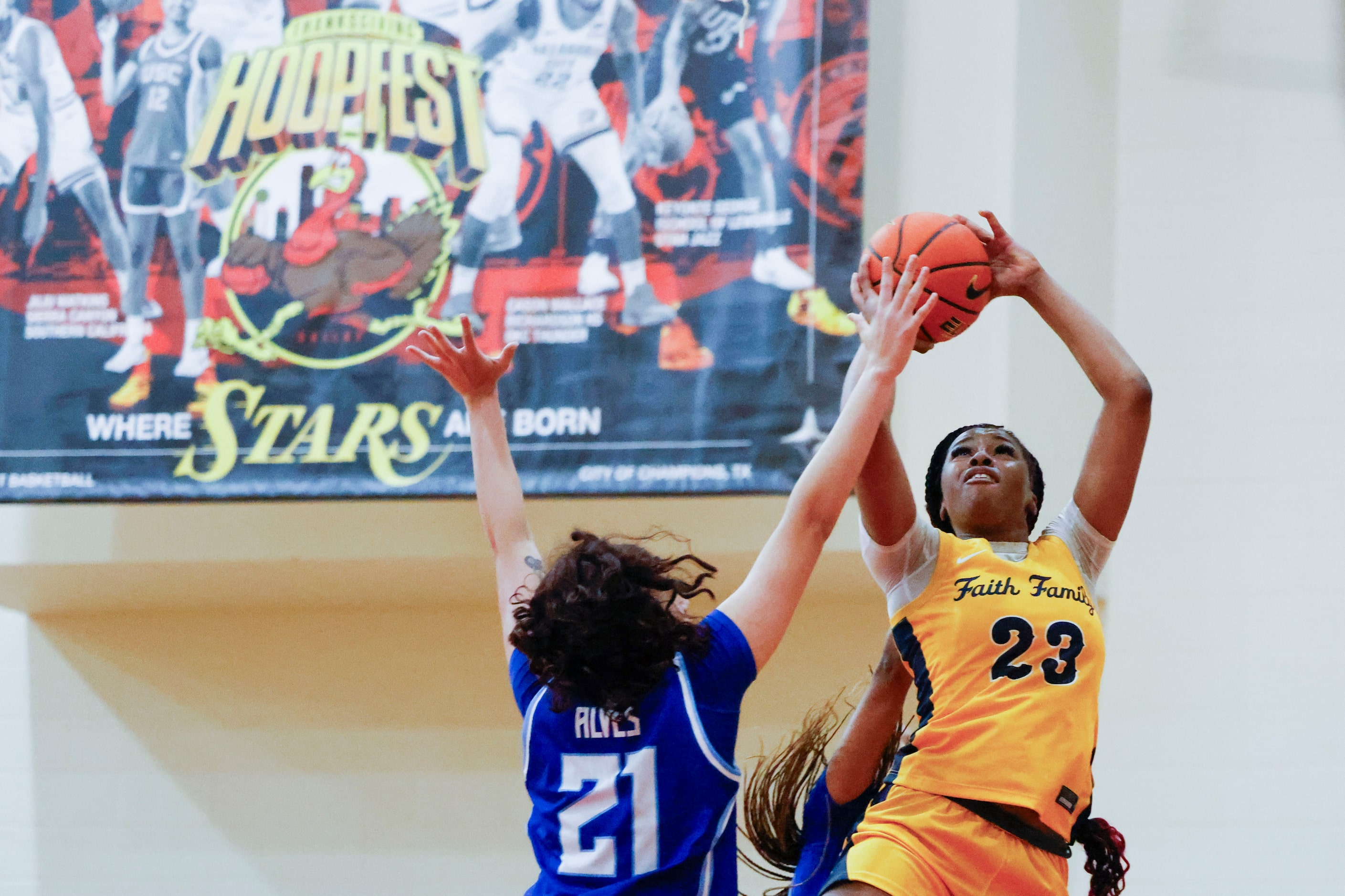 Oak Cliff Faith Family Academy’s Joy Egbuna (23) shoots past IMG Academy’s Manuella Alves...