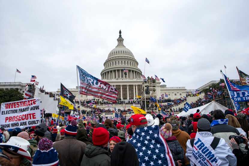Supporters of ex-President Donald Trump rally at the U.S. Capitol in Washington on Jan. 6,...
