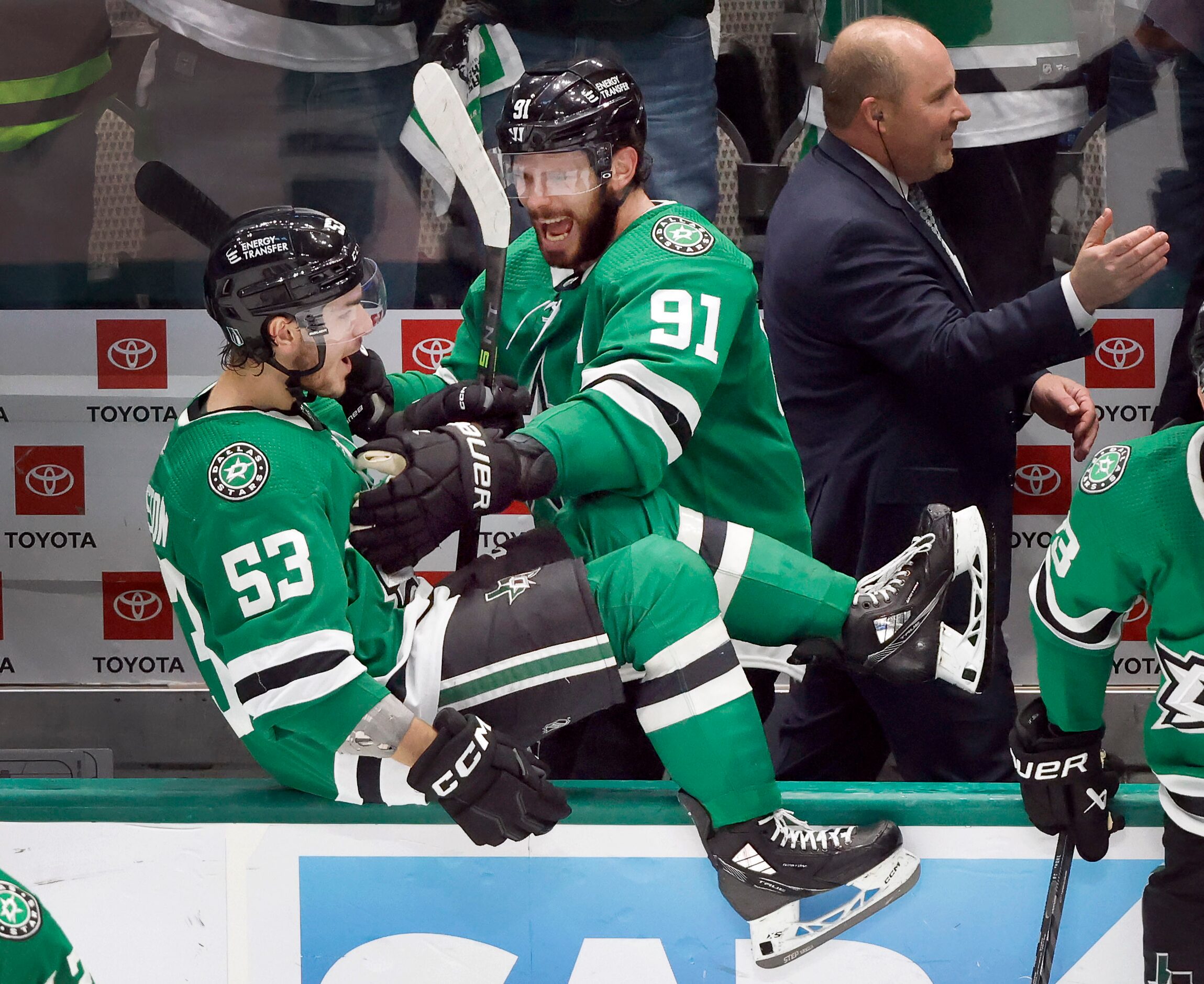 Dallas Stars center Tyler Seguin (91) and center Wyatt Johnston (53) celebrate their 2-1 win...