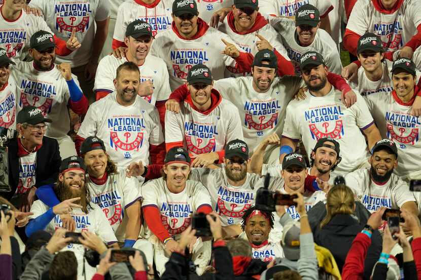 Philadelphia Phillies celebrate after winning the baseball NL Championship Series in Game 5...