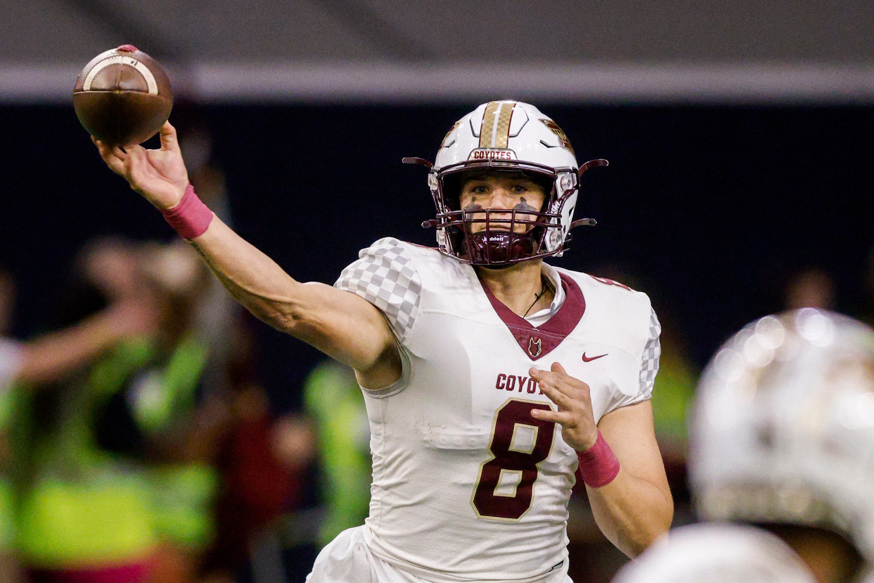 Frisco Heritage quarterback Bryce Gilchrist (8) throws a pass during the first half of a...